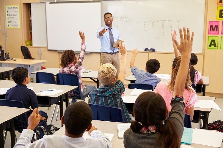 kids-raising-hands-class