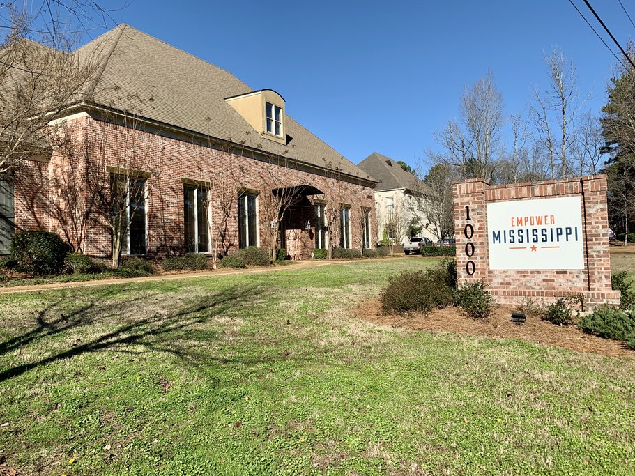 The Empower Mississippi office, a brick building with the organisation’s sign at the roadside
